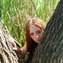 Girl behind tree 3