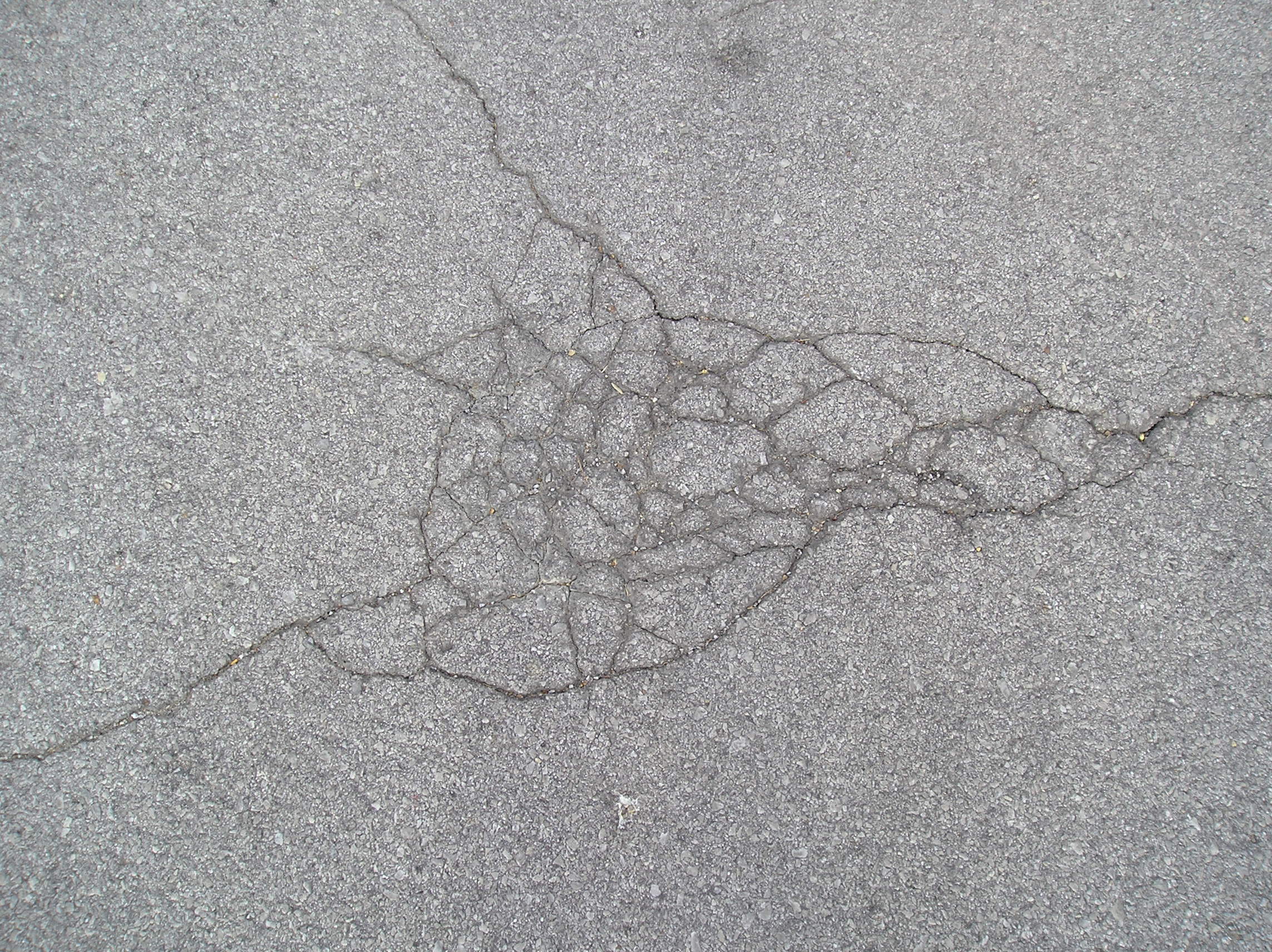 BASIC TERMS, Cracked Asphalt