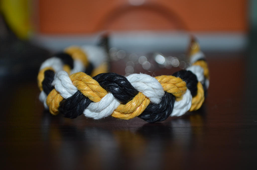 yellow white black braided bracelet