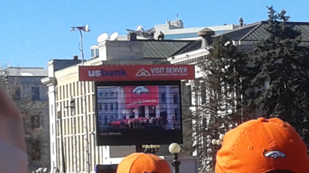 Watching the celebration on another big screen