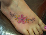 franjipani foot tattoo