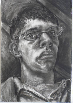 Self portrait in charcoal