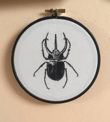 Dot work beetle embroidery