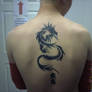 Tribal Dragon Tattoo