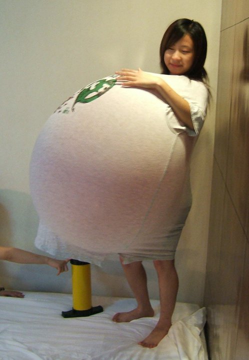 balloon stuffing in oversized t-shirt