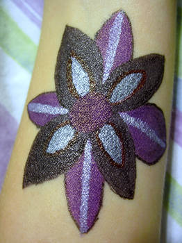 Eight Petaled Flower Tattoo