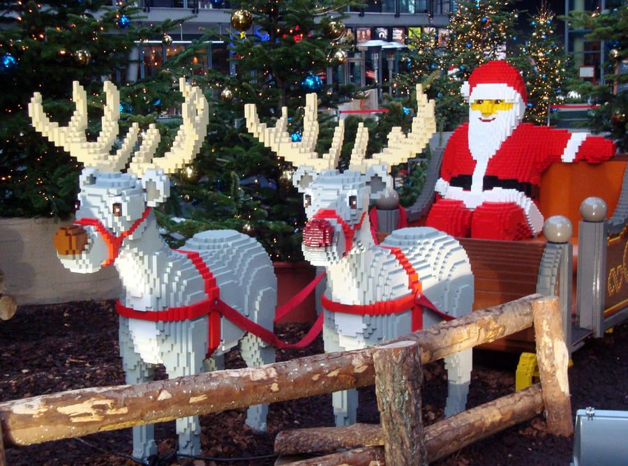 Santa Claus and his skid powered by his reindeers