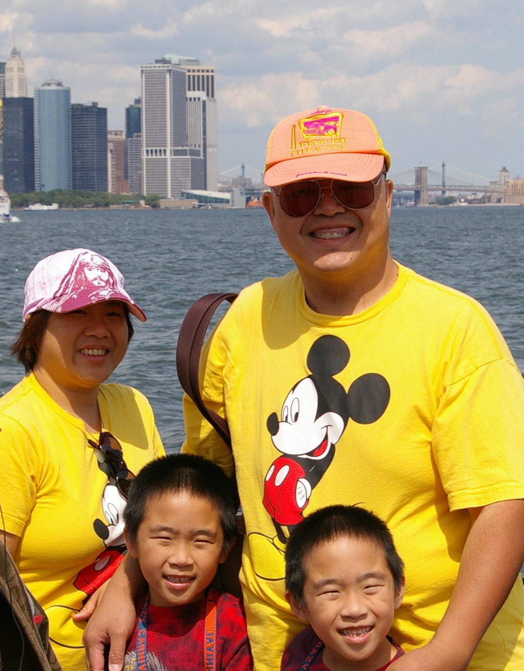 big smile with the big apple behind