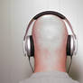 Bald man wearing Headphones 2