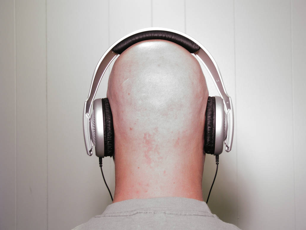 Bald man wearing Headphones 2