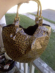 Leopard print and black hobo purse