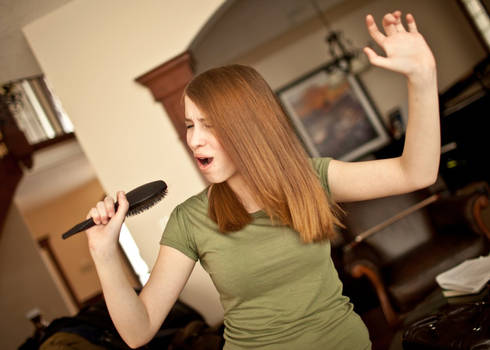 Teenage Girl Singing Stock