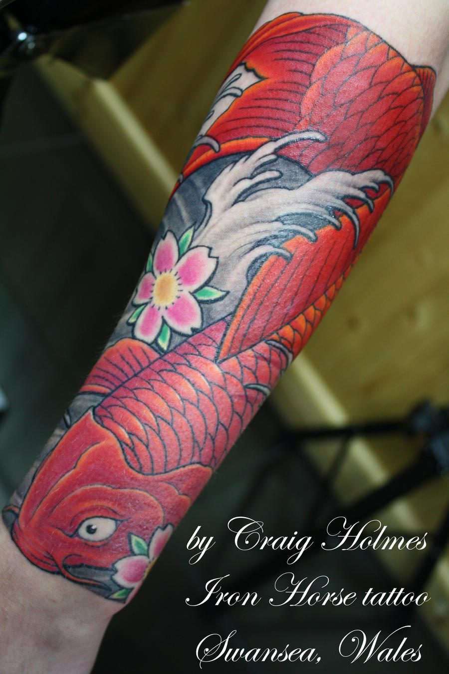 Red koi fish tattoo by Craig Holmes