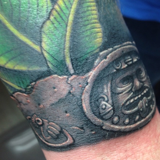 Mayan calendar around wrist tattoo by craig holmes