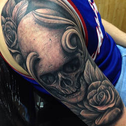 Skull and Roses sleeve tattoo by Craig Holmes