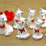 White Oriental Foxes and Cats