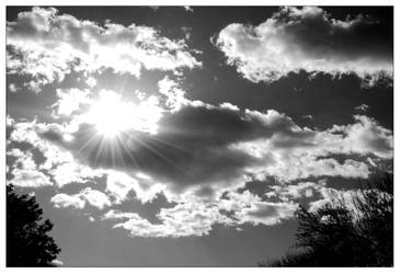 black and white clouded sun