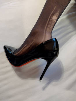 Damaged black stocking