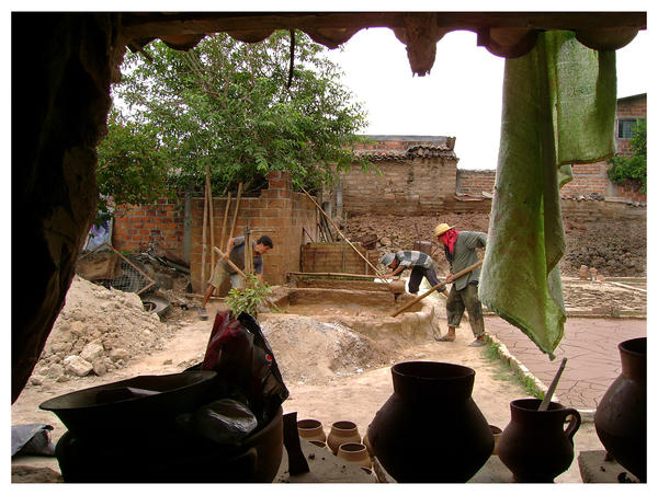 Potters making mud