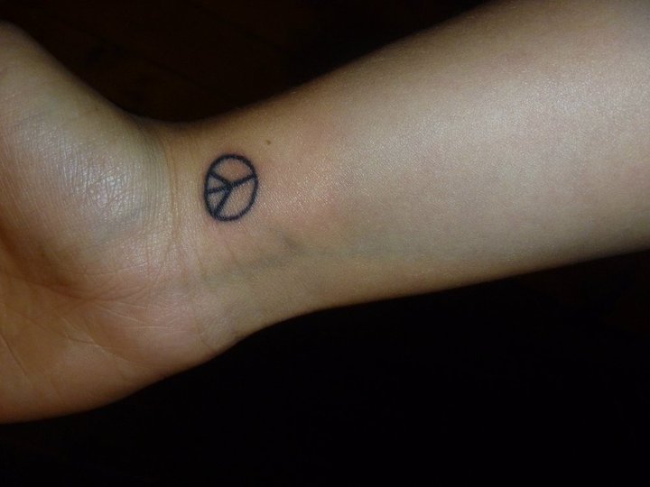 small peace tattoo