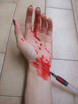 My hand, syringe, blood by SilvieT-Stock