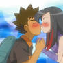 Brock and Lucy kissing