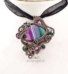 Green and purple striped agate pendant