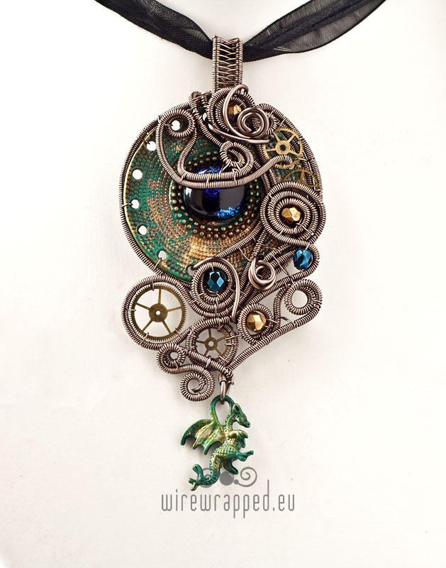 Steampunk pendant with a dragon charm