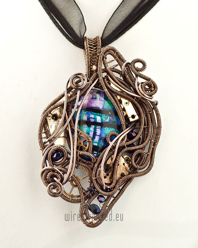 Purple and teal glass steampunk pendant