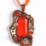 Orange steampunk pendant