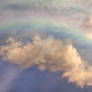 Clouds with rainbow 1 STOCK