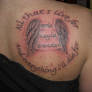 wings with saying tattoo