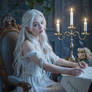 A Woman with Long White Hair Writing a Poem