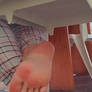 Soles Close-Up Under the Table