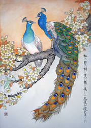 Peacocks on a yellow sakura branch