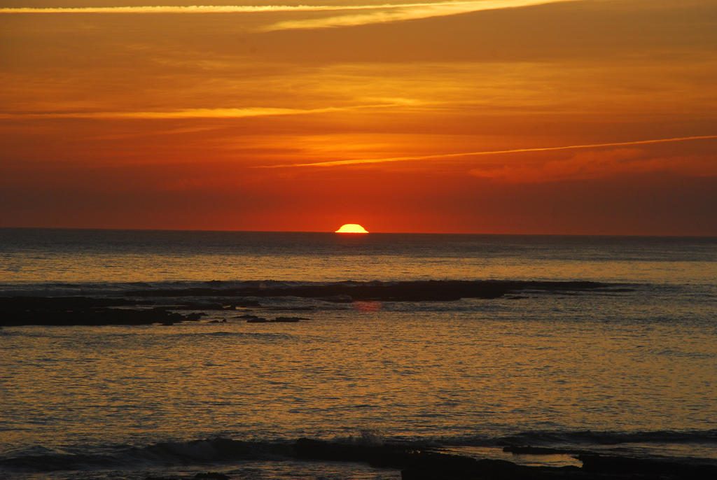 last sun at the atlantic sea