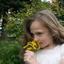 Girl Smelling Yellow Flowers 4