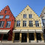 Red Yellow and White Houses on Blue Sky