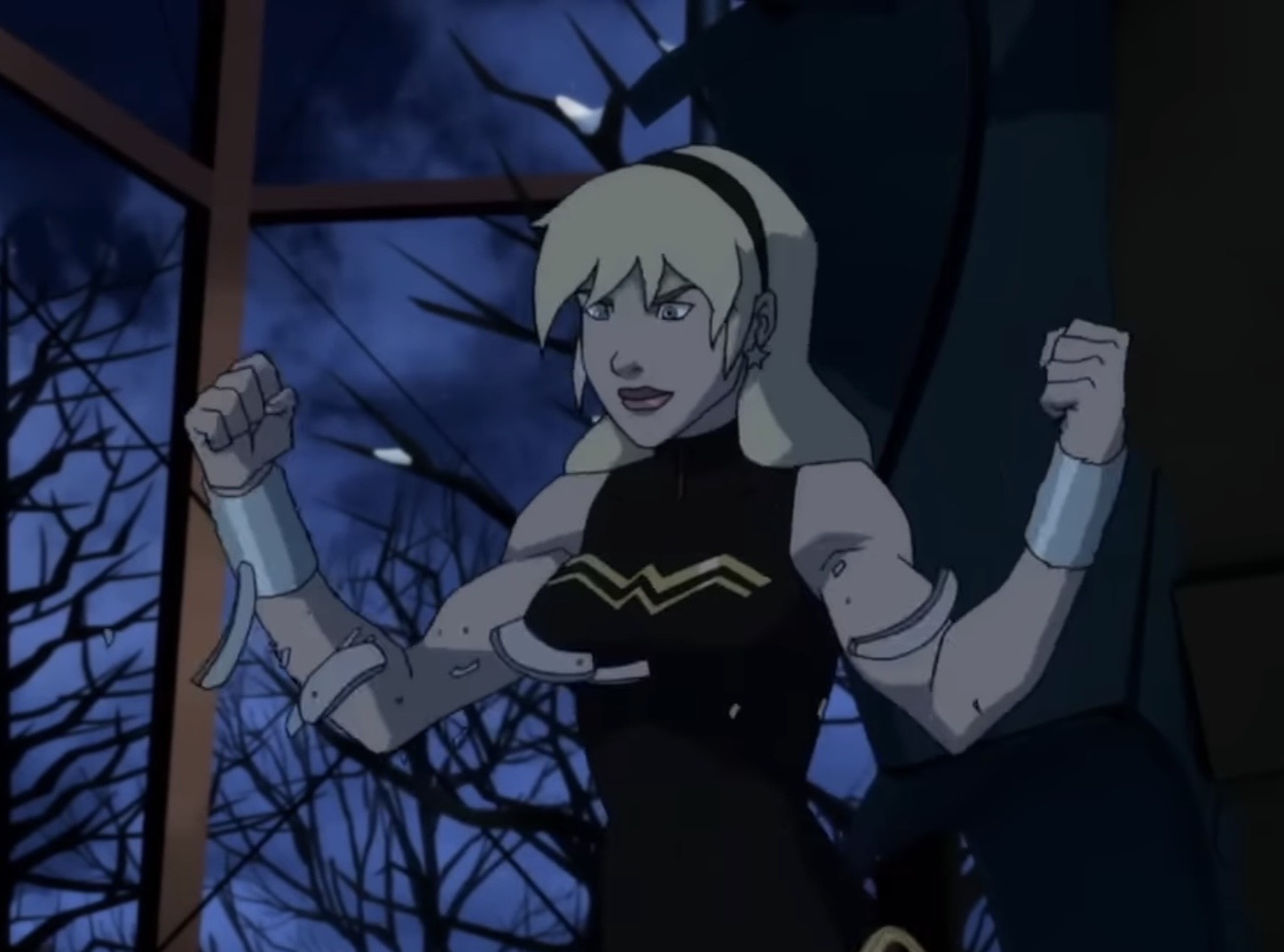 Wonder Girl breaks her handcuffs