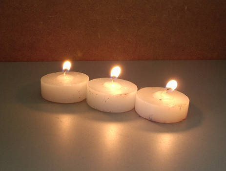 Three Small Round Candles