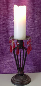 Glowing White Candle on Stand