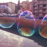 Three little iridescent bubbles