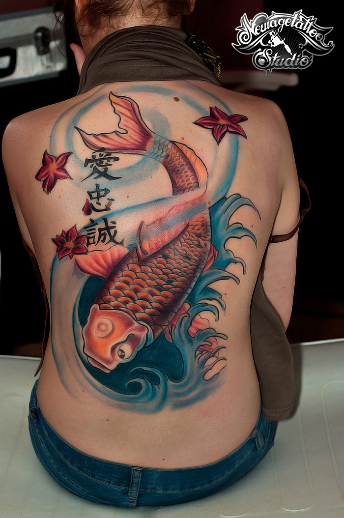 girl back tattoo of coi fish free hand