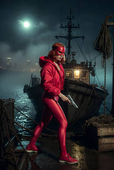 WOMAN IN RED SEARCHES THE DOCKS