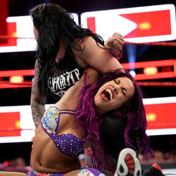 Ruby Riott torturing Sasha Banks