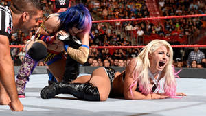 Asuka torturing Alexa Bliss