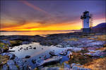 Sunset over Rhue Lighhouse by ketscha