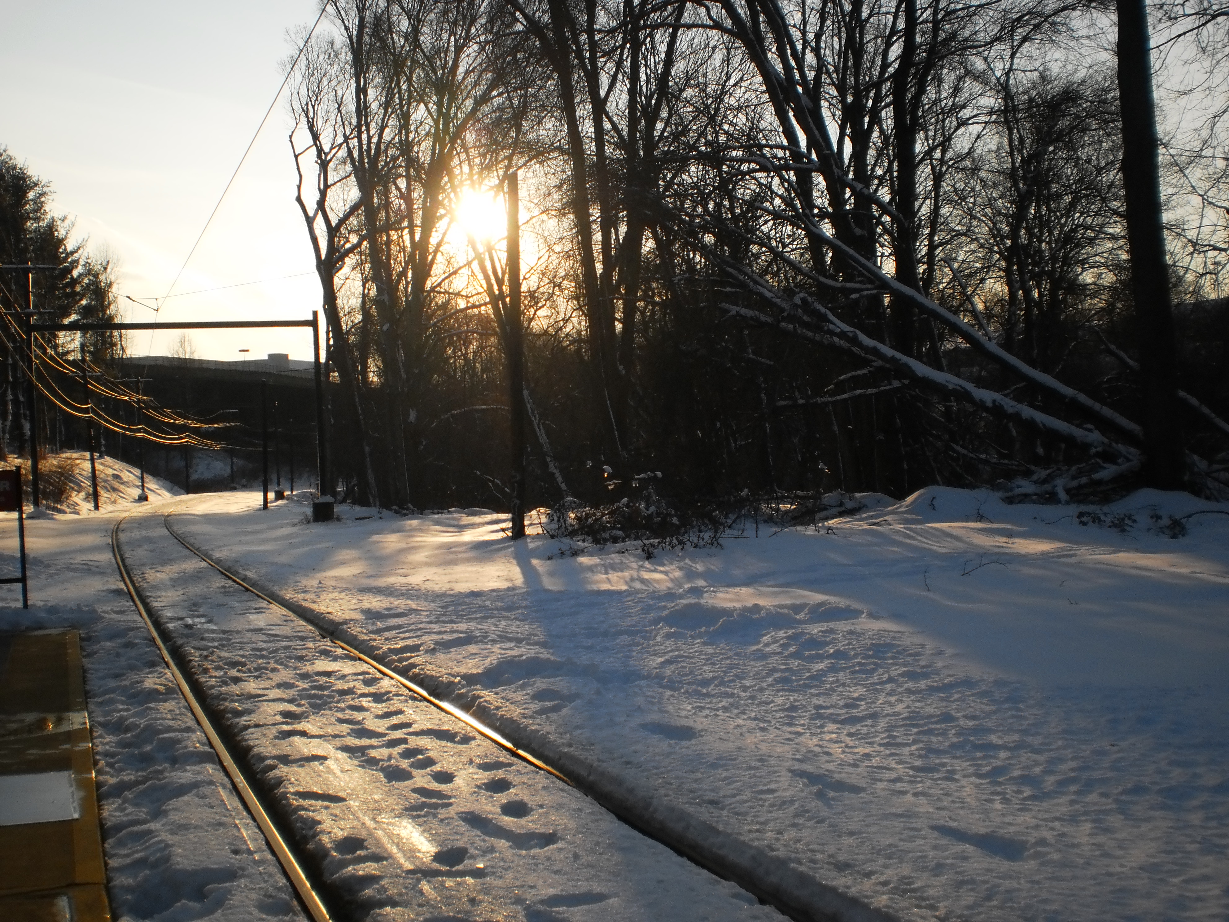 Sunset and snow with tracks