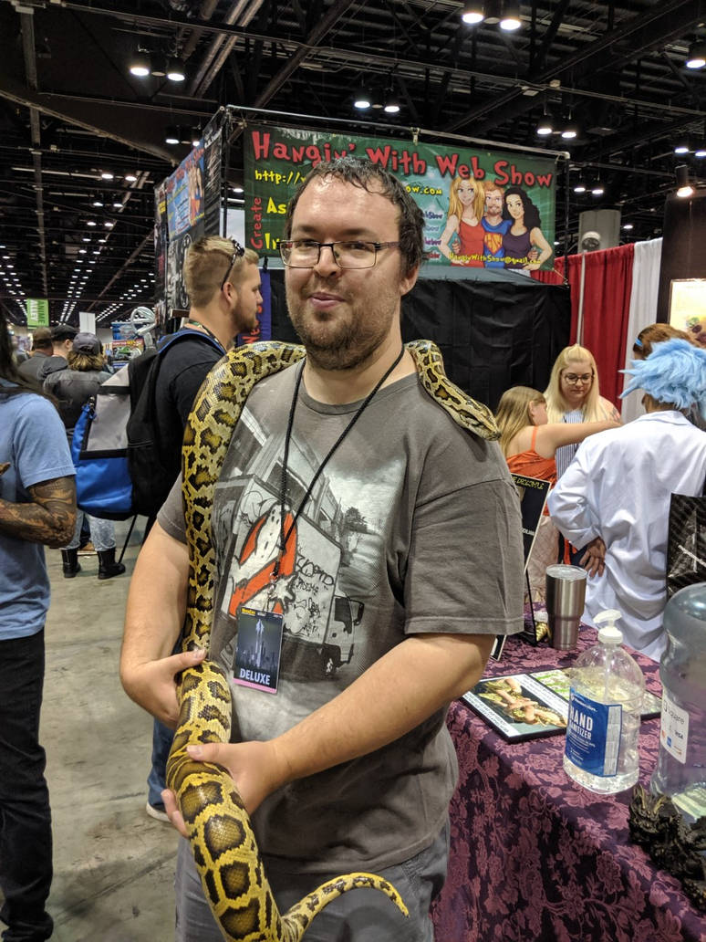 Holding a Burmese Python. by Kaiju-Brawler911 on DeviantArt