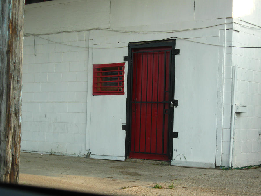 Locked Red Barred Door - Stock